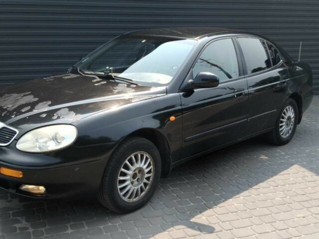 Черный Дэу Леганза, объемом двигателя 2.2 л и пробегом 200 тыс. км за 2000 $, фото 1 на Automoto.ua