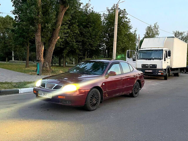 Красный Дэу Леганза, объемом двигателя 2 л и пробегом 337 тыс. км за 850 $, фото 1 на Automoto.ua