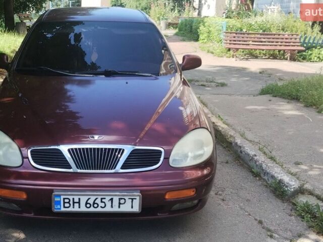 Червоний Деу Леганза, об'ємом двигуна 2 л та пробігом 300 тис. км за 1700 $, фото 1 на Automoto.ua