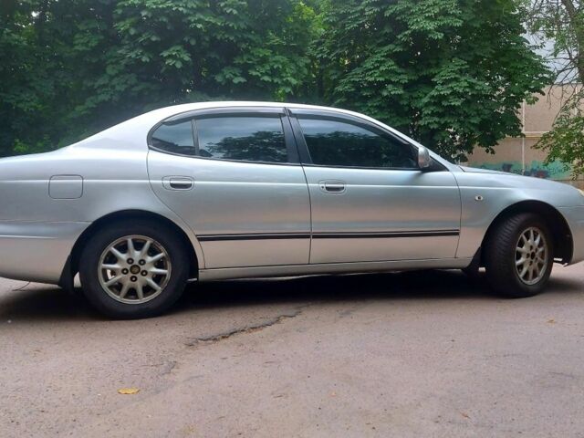 Красный Дэу Леганза, объемом двигателя 0.8 л и пробегом 485 тыс. км за 3000 $, фото 1 на Automoto.ua