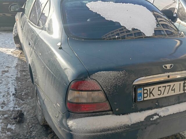 Синий Дэу Леганза, объемом двигателя 2 л и пробегом 300 тыс. км за 1600 $, фото 1 на Automoto.ua