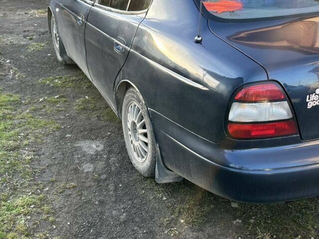 Синій Деу Леганза, об'ємом двигуна 2 л та пробігом 298 тис. км за 1750 $, фото 1 на Automoto.ua