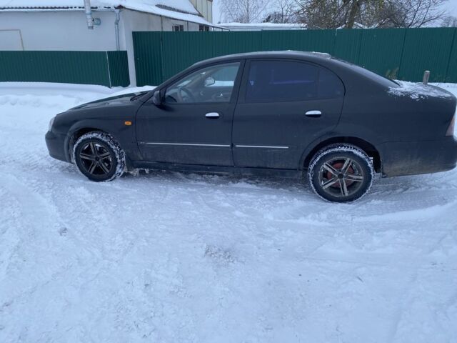 Черный Дэу Магнус, объемом двигателя 2 л и пробегом 360 тыс. км за 1710 $, фото 1 на Automoto.ua