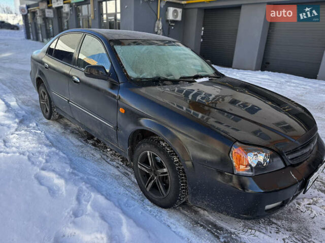 Чорний Деу Магнус, об'ємом двигуна 2 л та пробігом 390 тис. км за 2000 $, фото 1 на Automoto.ua