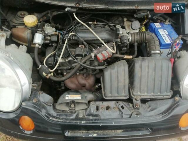 Черный Дэу Матиз, объемом двигателя 0.8 л и пробегом 199 тыс. км за 1300 $, фото 1 на Automoto.ua