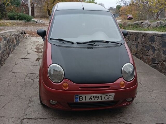 Красный Дэу Матиз, объемом двигателя 0.8 л и пробегом 120 тыс. км за 2000 $, фото 1 на Automoto.ua