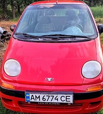 Красный Дэу Матиз, объемом двигателя 0.8 л и пробегом 123 тыс. км за 1000 $, фото 1 на Automoto.ua