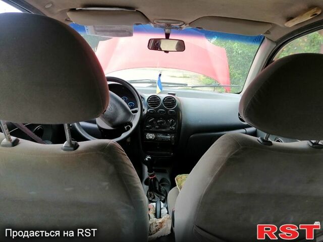 Красный Дэу Матиз, объемом двигателя 0.8 л и пробегом 153 тыс. км за 2200 $, фото 1 на Automoto.ua