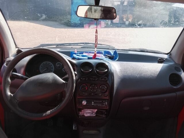 Красный Дэу Матиз, объемом двигателя 0.8 л и пробегом 100 тыс. км за 1700 $, фото 1 на Automoto.ua