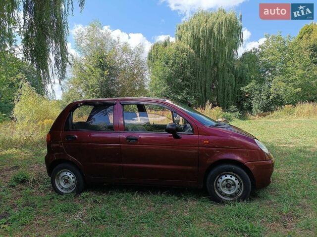 Красный Дэу Матиз, объемом двигателя 0.8 л и пробегом 124 тыс. км за 1950 $, фото 1 на Automoto.ua