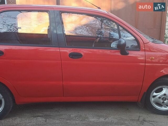 Красный Дэу Матиз, объемом двигателя 0.8 л и пробегом 136 тыс. км за 1800 $, фото 1 на Automoto.ua