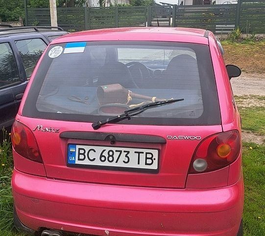 Красный Дэу Матиз, объемом двигателя 0.8 л и пробегом 100 тыс. км за 1558 $, фото 1 на Automoto.ua