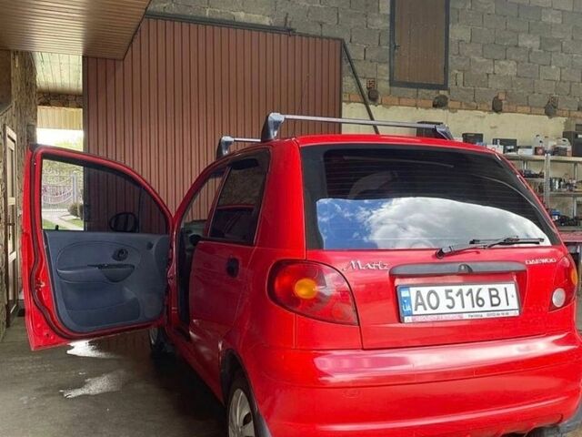 Красный Дэу Матиз, объемом двигателя 0.8 л и пробегом 124 тыс. км за 1800 $, фото 1 на Automoto.ua