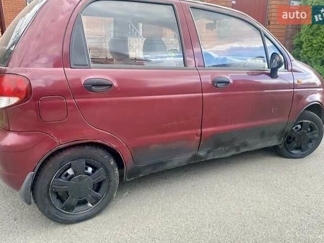 Красный Дэу Матиз, объемом двигателя 0.8 л и пробегом 140 тыс. км за 1100 $, фото 1 на Automoto.ua