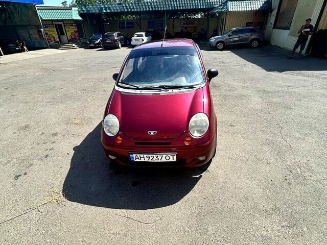Красный Дэу Матиз, объемом двигателя 0.8 л и пробегом 157 тыс. км за 2300 $, фото 1 на Automoto.ua