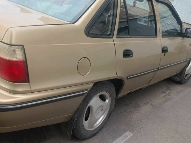 Бежевий Деу Нексія, об'ємом двигуна 1.5 л та пробігом 270 тис. км за 1500 $, фото 1 на Automoto.ua