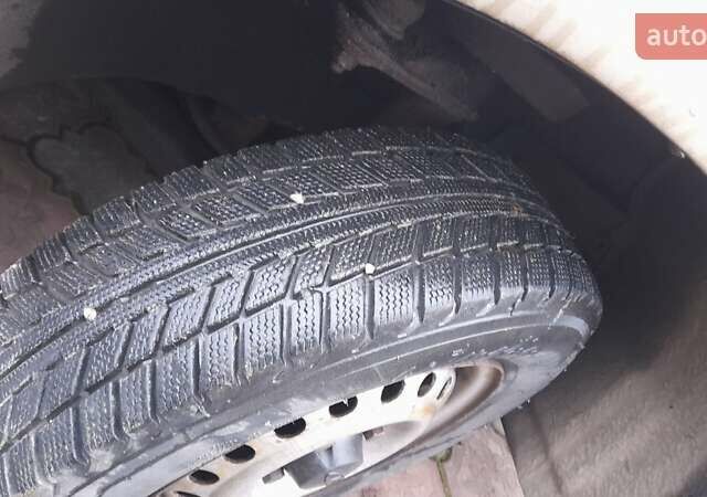 Бежевый Дэу Нексия, объемом двигателя 1.5 л и пробегом 245 тыс. км за 1900 $, фото 1 на Automoto.ua