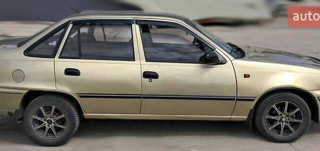 Бежевий Деу Нексія, об'ємом двигуна 1.5 л та пробігом 193 тис. км за 1648 $, фото 1 на Automoto.ua