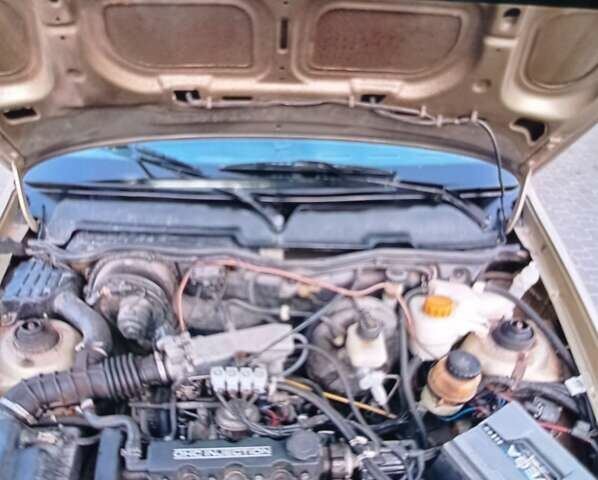 Бежевий Деу Нексія, об'ємом двигуна 1.5 л та пробігом 160 тис. км за 1200 $, фото 1 на Automoto.ua