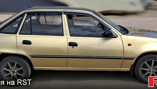 Бежевий Деу Нексія, об'ємом двигуна 15 л та пробігом 193 тис. км за 1600 $, фото 1 на Automoto.ua