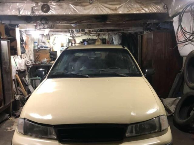 Бежевий Деу Нексія, об'ємом двигуна 1 л та пробігом 200 тис. км за 1200 $, фото 1 на Automoto.ua