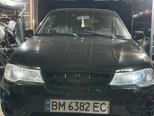 Чорний Деу Нексія, об'ємом двигуна 1.6 л та пробігом 235 тис. км за 1700 $, фото 1 на Automoto.ua