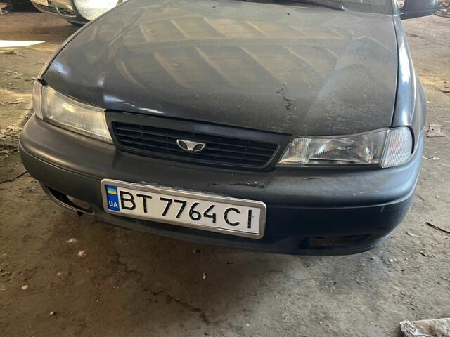 Чорний Деу Нексія, об'ємом двигуна 1.5 л та пробігом 255 тис. км за 1500 $, фото 1 на Automoto.ua