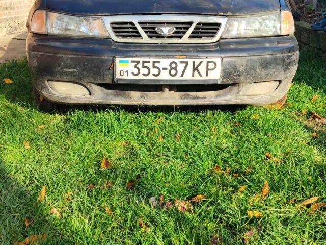 Чорний Деу Нексія, об'ємом двигуна 1.6 л та пробігом 304 тис. км за 713 $, фото 1 на Automoto.ua