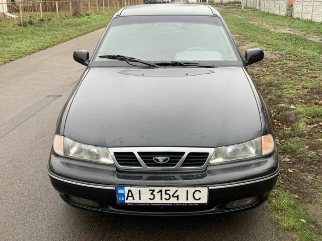 Черный Дэу Нексия, объемом двигателя 1.5 л и пробегом 200 тыс. км за 999 $, фото 1 на Automoto.ua