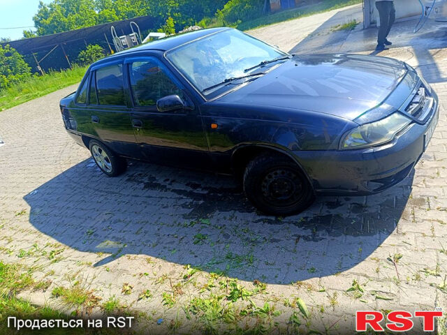 Черный Дэу Нексия, объемом двигателя 1.5 л и пробегом 331 тыс. км за 1700 $, фото 1 на Automoto.ua