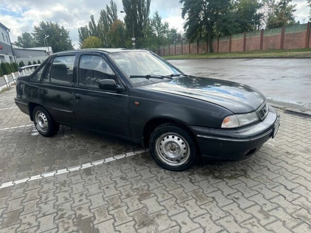 Черный Дэу Нексия, объемом двигателя 1.5 л и пробегом 213 тыс. км за 850 $, фото 1 на Automoto.ua
