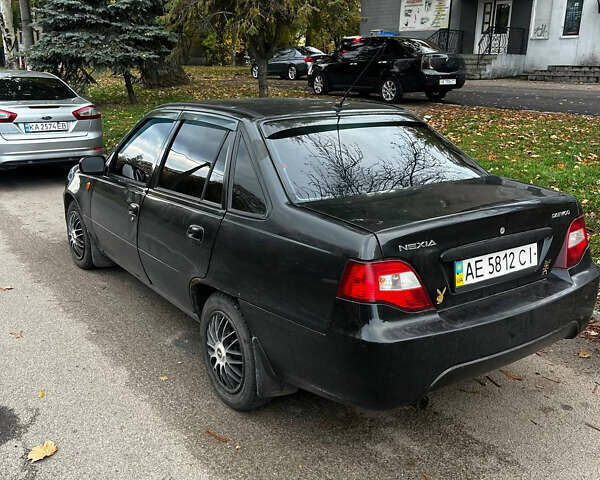 Черный Дэу Нексия, объемом двигателя 1.5 л и пробегом 250 тыс. км за 1450 $, фото 1 на Automoto.ua