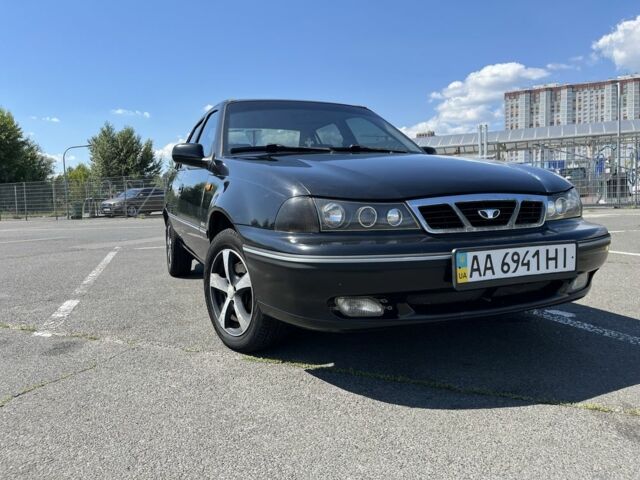 Чорний Деу Нексія, об'ємом двигуна 1.5 л та пробігом 140 тис. км за 2650 $, фото 1 на Automoto.ua