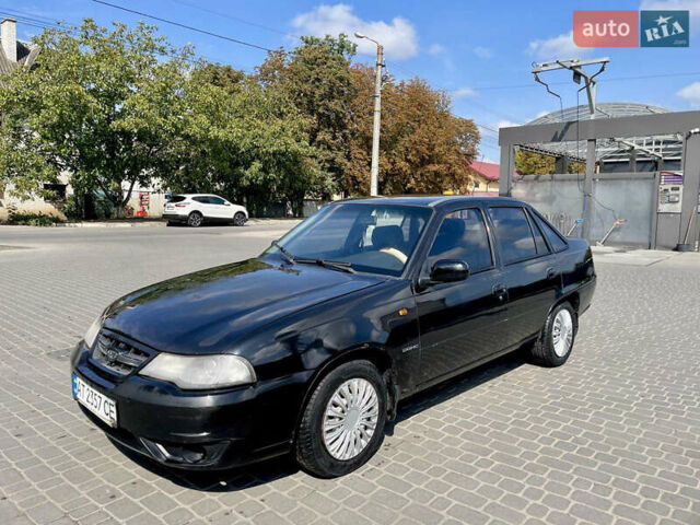 Черный Дэу Нексия, объемом двигателя 1.5 л и пробегом 170 тыс. км за 1400 $, фото 1 на Automoto.ua