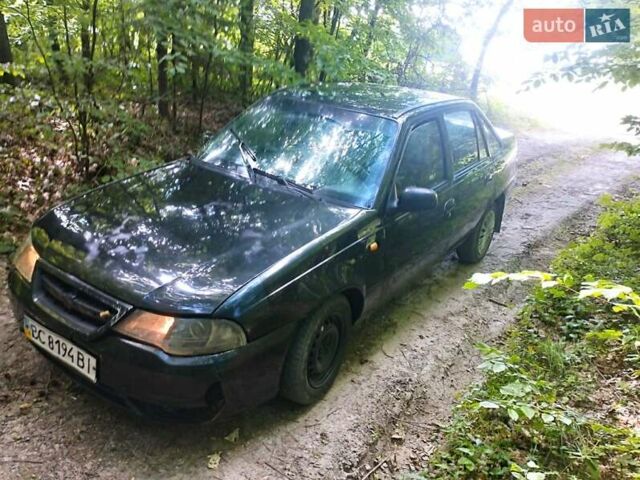 Чорний Деу Нексія, об'ємом двигуна 1.5 л та пробігом 260 тис. км за 1500 $, фото 1 на Automoto.ua