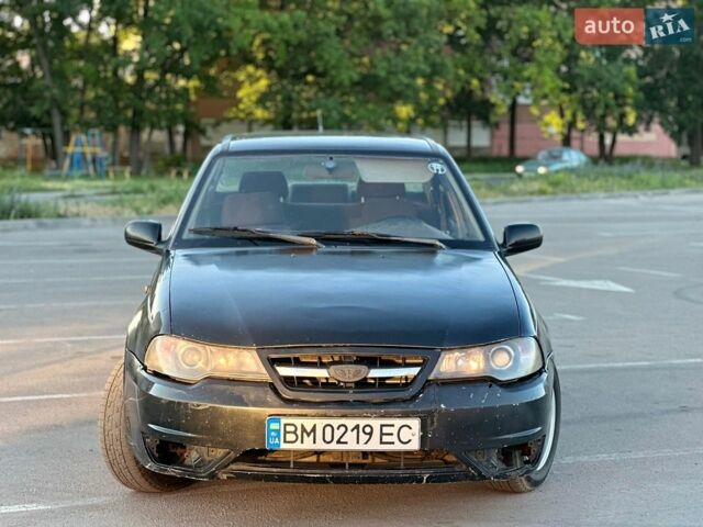 Черный Дэу Нексия, объемом двигателя 1.5 л и пробегом 260 тыс. км за 999 $, фото 1 на Automoto.ua