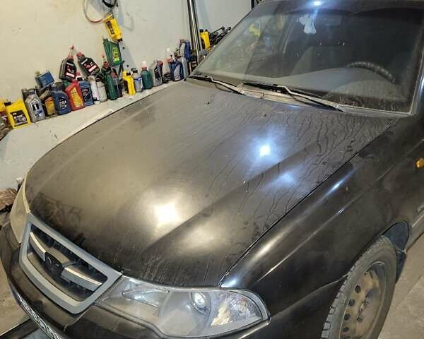 Чорний Деу Нексія, об'ємом двигуна 1.5 л та пробігом 301 тис. км за 1600 $, фото 1 на Automoto.ua