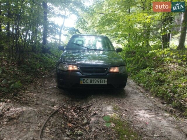 Черный Дэу Нексия, объемом двигателя 1.5 л и пробегом 260 тыс. км за 1500 $, фото 1 на Automoto.ua