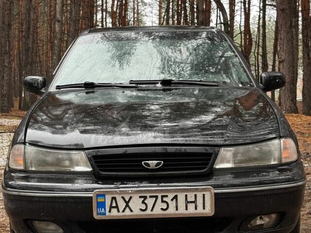 Черный Дэу Нексия, объемом двигателя 1.5 л и пробегом 570 тыс. км за 950 $, фото 1 на Automoto.ua