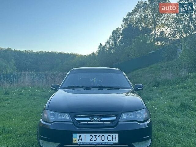 Черный Дэу Нексия, объемом двигателя 1.6 л и пробегом 219 тыс. км за 1600 $, фото 1 на Automoto.ua