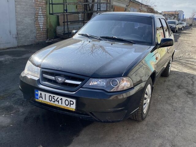 Черный Дэу Нексия, объемом двигателя 1.5 л и пробегом 225 тыс. км за 2100 $, фото 1 на Automoto.ua