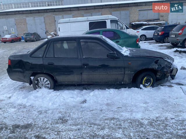 Черный Дэу Нексия, объемом двигателя 1.6 л и пробегом 244 тыс. км за 1200 $, фото 1 на Automoto.ua