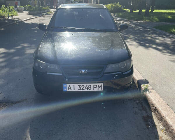 Черный Дэу Нексия, объемом двигателя 1.5 л и пробегом 178 тыс. км за 2350 $, фото 1 на Automoto.ua