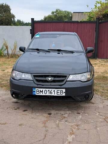 Чорний Деу Нексія, об'ємом двигуна 1.5 л та пробігом 112 тис. км за 1500 $, фото 1 на Automoto.ua