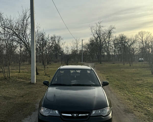 Чорний Деу Нексія, об'ємом двигуна 1.5 л та пробігом 141 тис. км за 2500 $, фото 1 на Automoto.ua