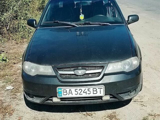 Чорний Деу Нексія, об'ємом двигуна 1.6 л та пробігом 300 тис. км за 808 $, фото 1 на Automoto.ua