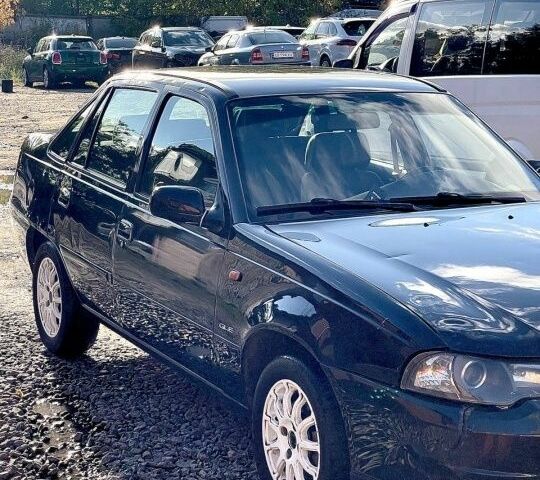 Деу Нексія 2011 у Вінниці на Automoto.ua Чорний Деу Нексія, об'ємом двигуна 1.6 л та пробігом 95 тис. км за 2200 $, фото 1 на Automoto.ua