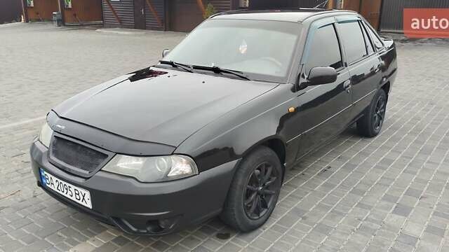 Чорний Деу Нексія, об'ємом двигуна 1.5 л та пробігом 160 тис. км за 3300 $, фото 1 на Automoto.ua