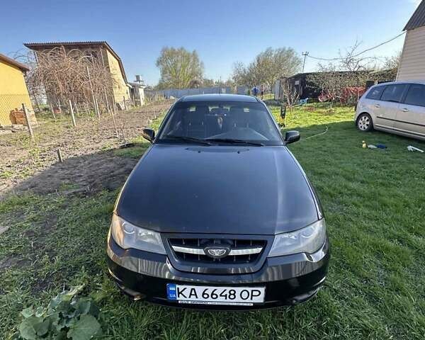 Чорний Деу Нексія, об'ємом двигуна 1.5 л та пробігом 160 тис. км за 2000 $, фото 1 на Automoto.ua