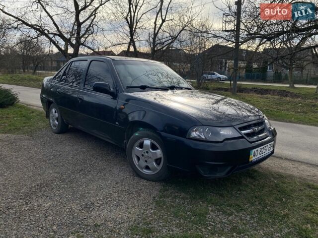 Чорний Деу Нексія, об'ємом двигуна 1.6 л та пробігом 169 тис. км за 1700 $, фото 1 на Automoto.ua